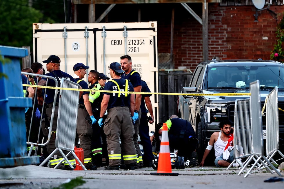 Paramedics respond to an active shooter at the Salsa on St. Clair event in Toronto, Saturday,...