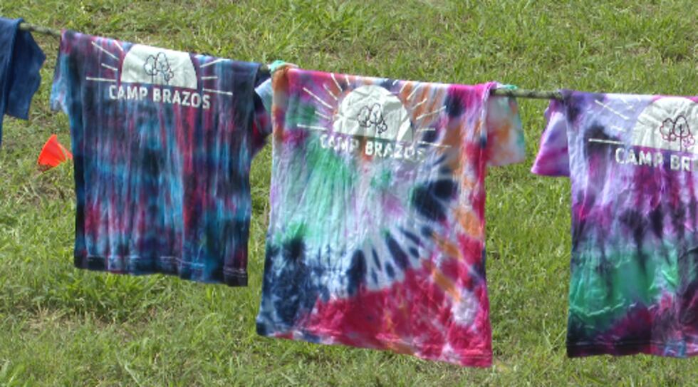 Campers helped tie dye and wash their camp shirts