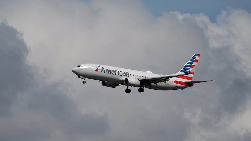 FILE -- An American Airlines plane comes in to land at Miami International Airport, Monday,...