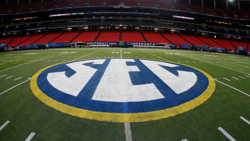 FILE - In this Dec. 5, 2014, file photo, the SEC logo is displayed on the field ahead of the...