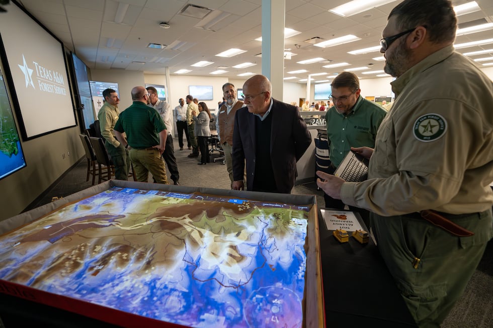 Jeffrey W. Savell, Ph.D., vice chancellor and dean for Agriculture and Life Sciences, watches...