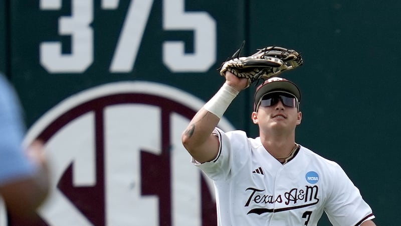 Texas A&M outfielder Jake Duer (3) makes a catch against Lamar during an NCAA regional...