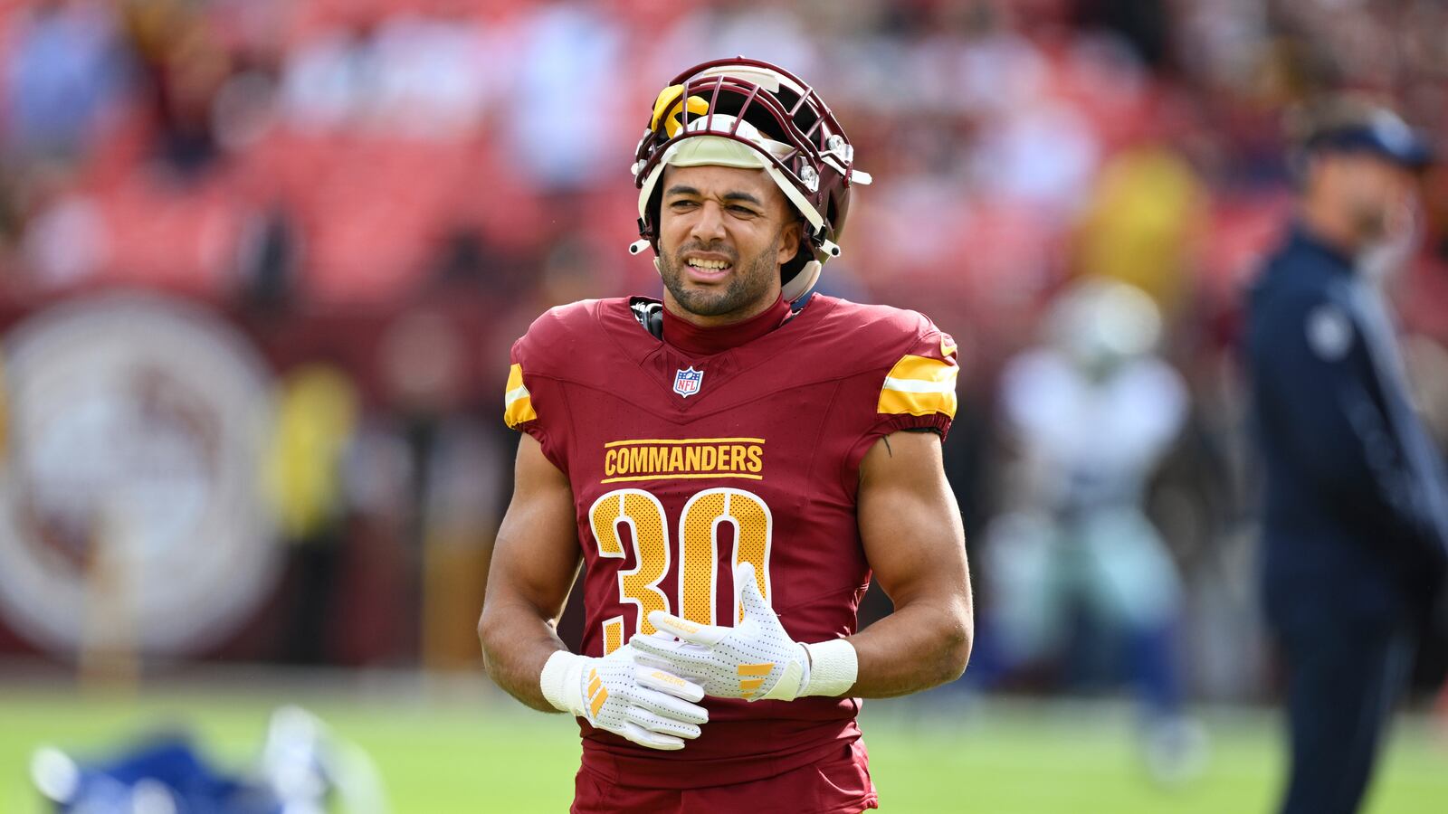 Austin Ekeler was concussed late in the Commanders' loss and taken to